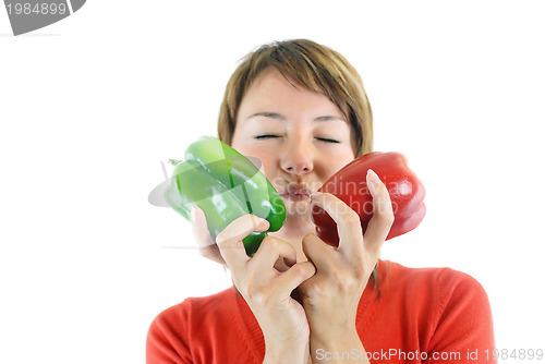 Image of pretty girl with pepper isolated