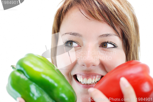Image of pretty girl with pepper isolated