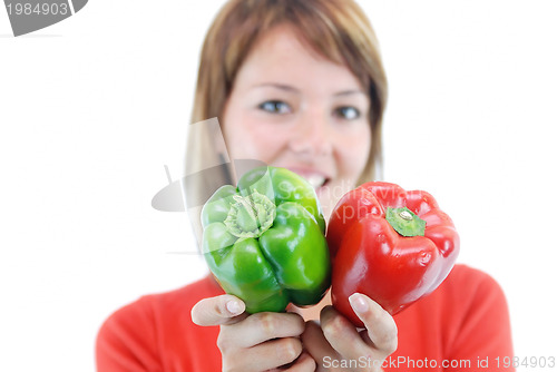 Image of pretty girl with pepper isolated