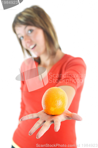 Image of happy girl with orange in hand