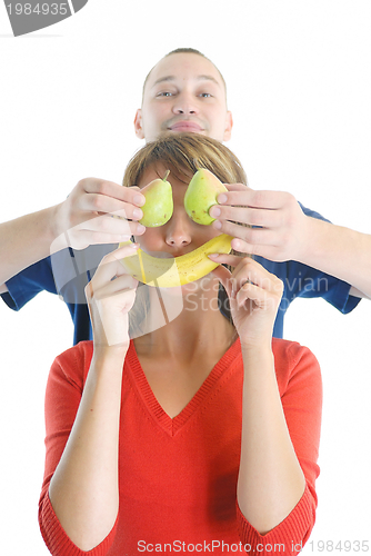 Image of happy and healthy couple with fruits