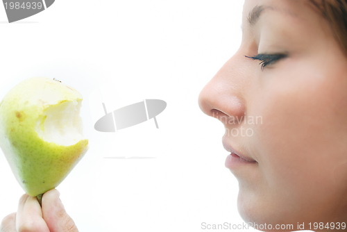 Image of beautiful girl with pear