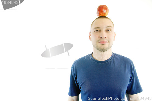 Image of man with apple on head