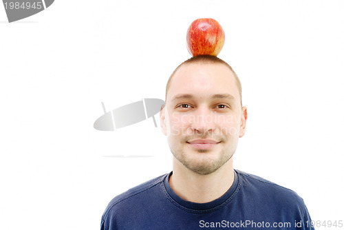 Image of man with apple on head