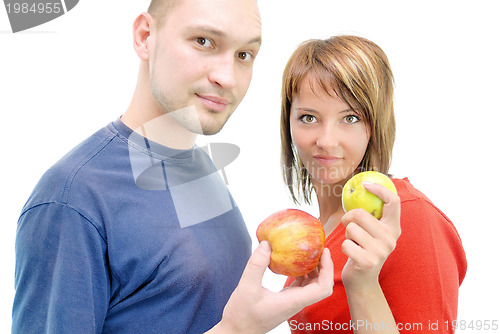 Image of healthy couple with apple