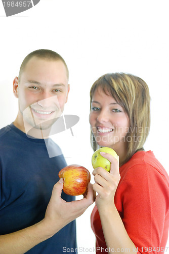 Image of healthy couple with apple