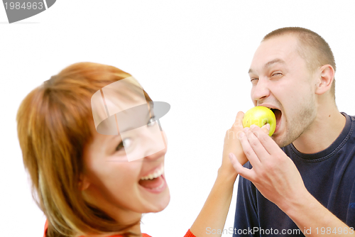 Image of healthy couple with apple