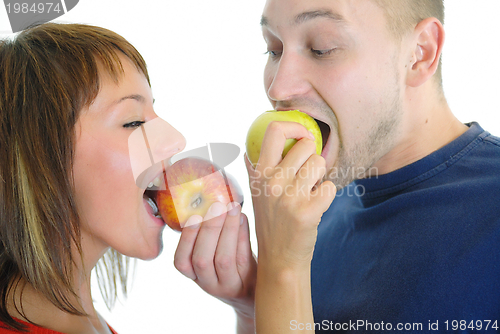Image of healthy couple with apple