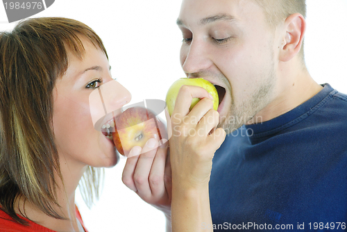 Image of healthy couple with apple