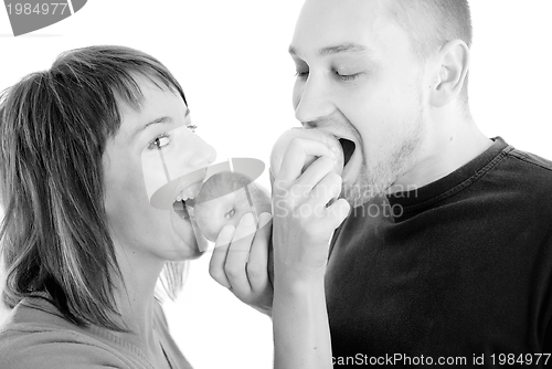 Image of healthy couple with apple