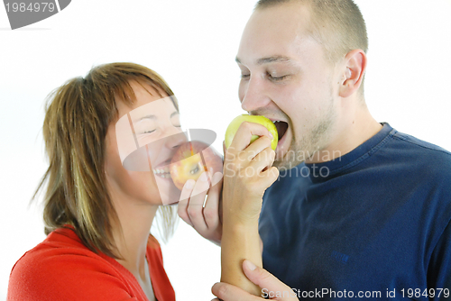 Image of healthy couple with apple