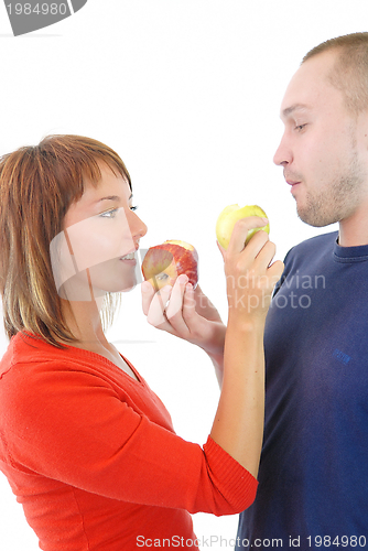 Image of healthy couple with apple