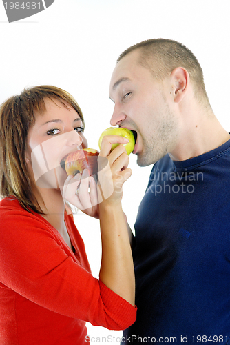 Image of healthy couple with apple