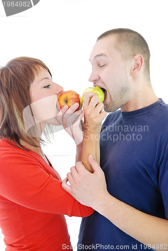 Image of happy couple eating apples