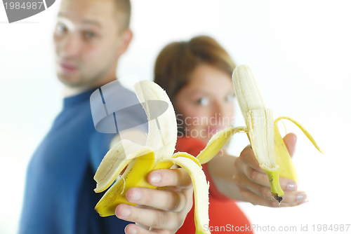 Image of happy couple with bananas