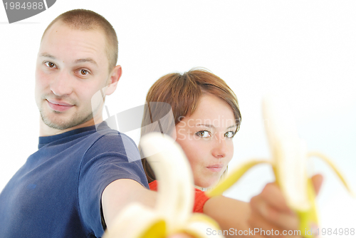 Image of happy couple with bananas