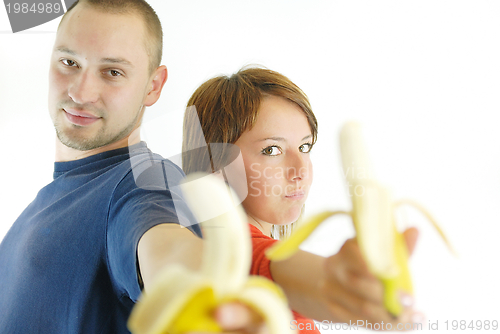 Image of happy couple with bananas