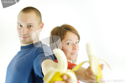 Image of happy couple with bananas