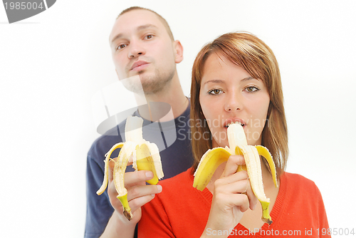 Image of happy couple with bananas