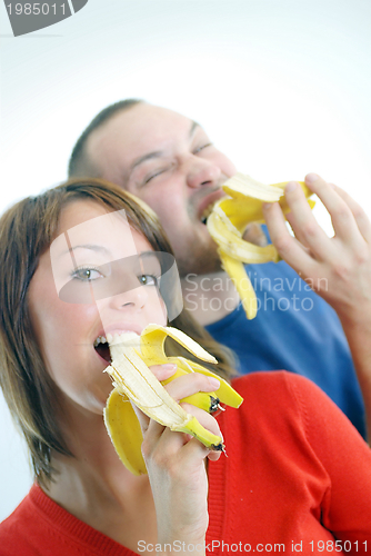 Image of happy couple with bananas