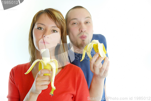 Image of happy couple with bananas