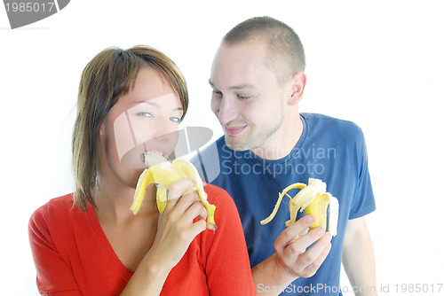 Image of happy couple with bananas