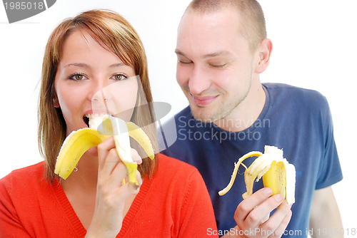 Image of happy couple with bananas