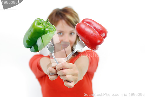 Image of pretty girl with pepper isolated