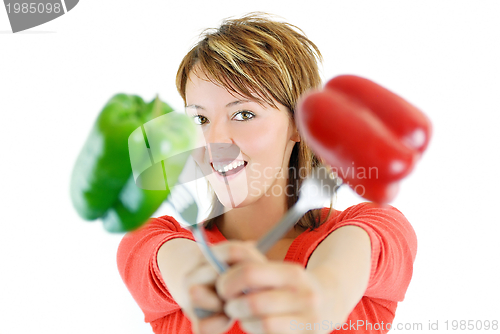 Image of pretty girl with pepper isolated