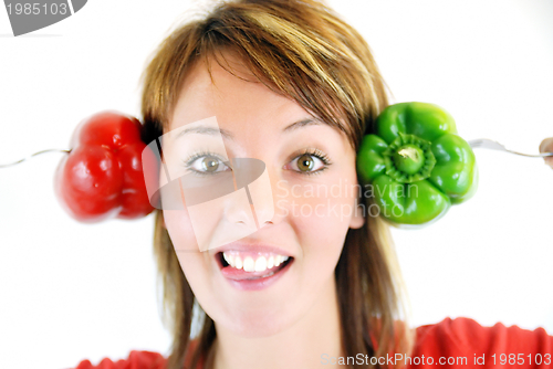 Image of pretty girl with pepper isolated