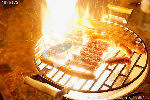 Image of sausages on grill