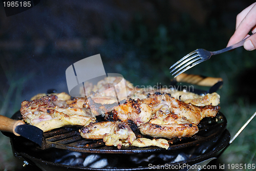 Image of chicken on grill