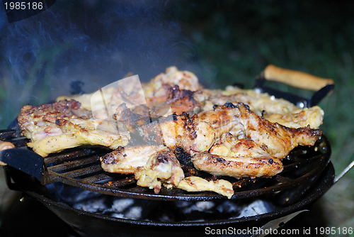 Image of chicken on grill