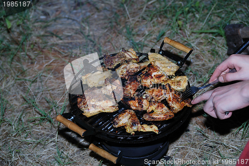 Image of chicken on grill