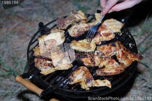 Image of chicken on grill