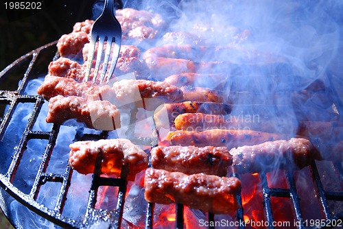 Image of sausages on grill