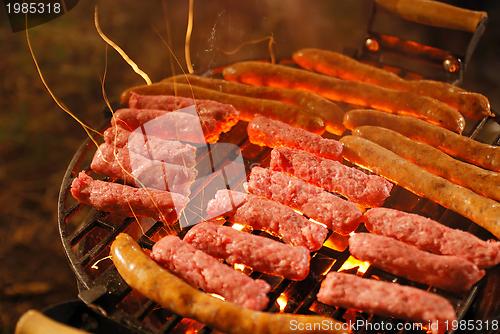 Image of sausages on grill