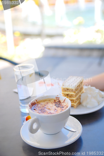 Image of cake and coffee on table