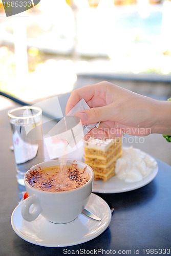 Image of cake and coffee on table