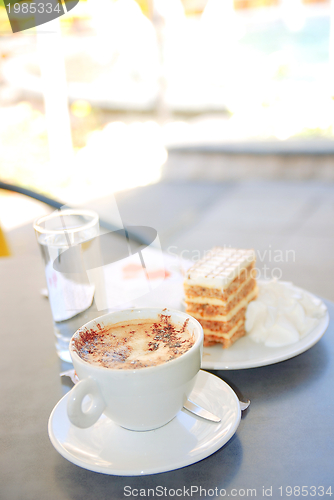 Image of cake and coffee on table