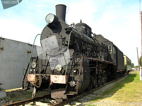 Image of Ancient black steam locomotive