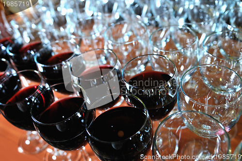 Image of red wine glasses backgound party