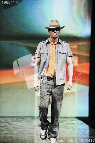 Image of male model on fashion show