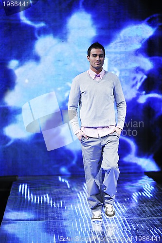 Image of male model on fashion show