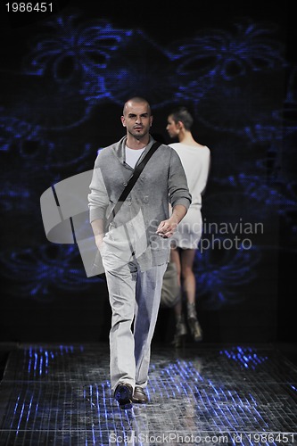 Image of male model on fashion show