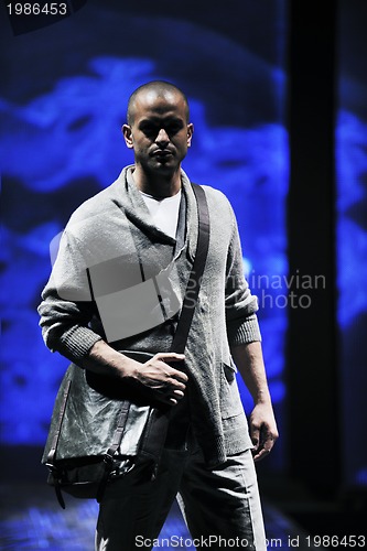 Image of male model on fashion show