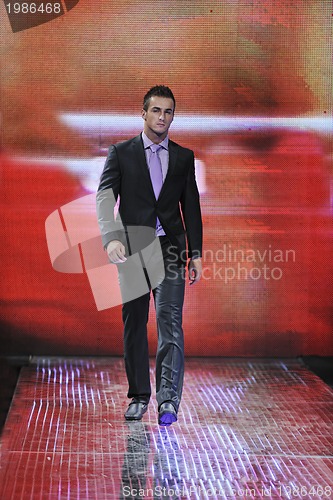 Image of male model on fashion show