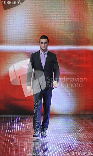 Image of male model on fashion show