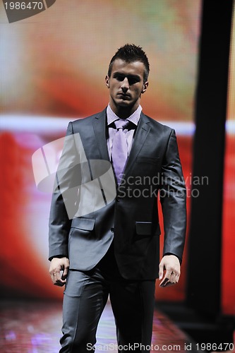 Image of male model on fashion show