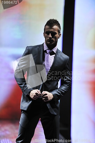 Image of male model on fashion show